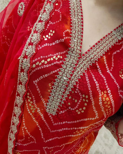 Stylish Red Bandhej Georgette Suit with Gold Lace Detailing