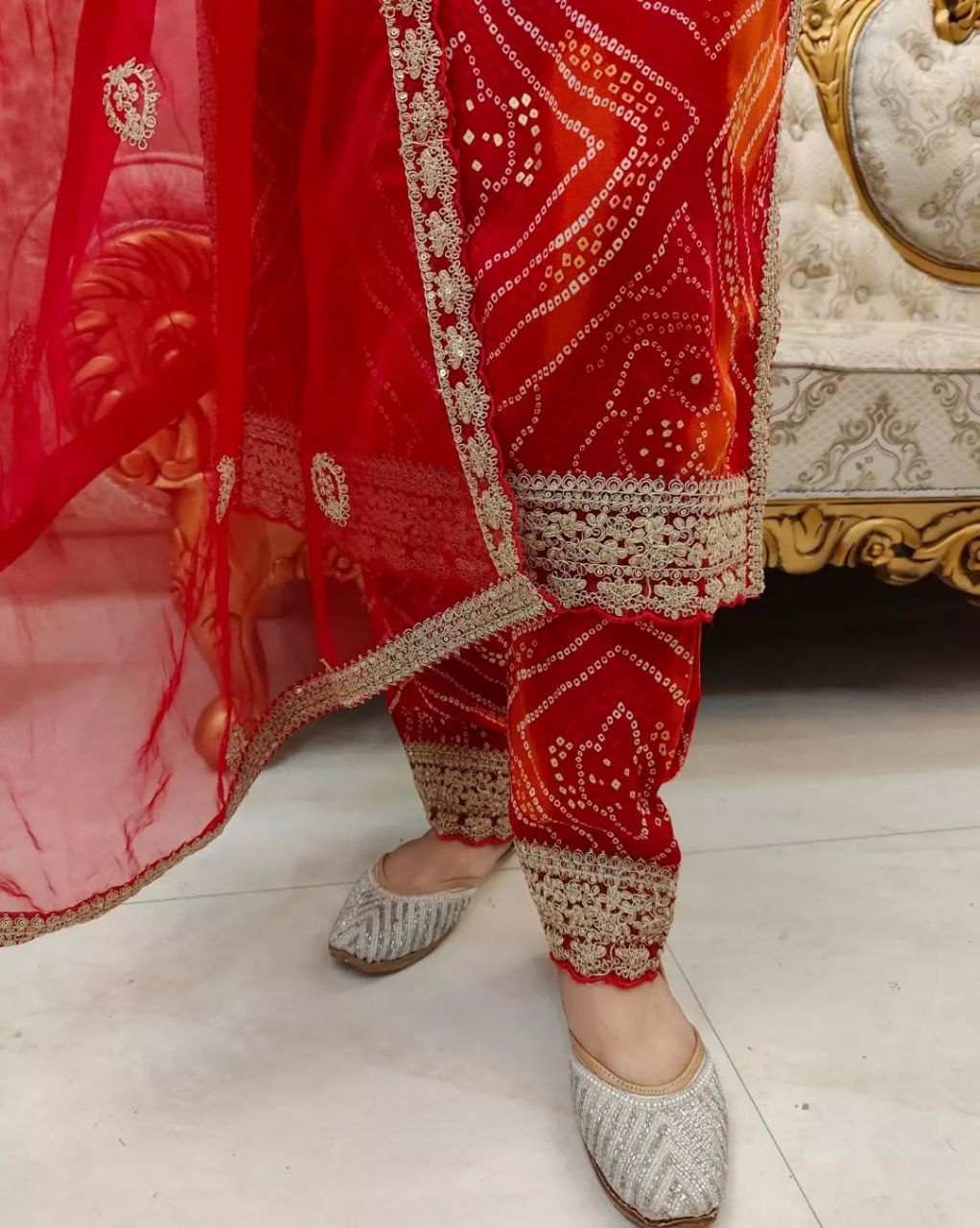 Stylish Red Bandhej Georgette Suit with Gold Lace Detailing